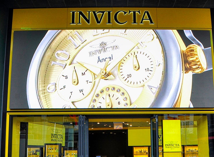 Invicta video display showing a gold watch