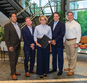 MEPPI President & CEO Tricia Breeger along with MEPPI and Austin Company personnel